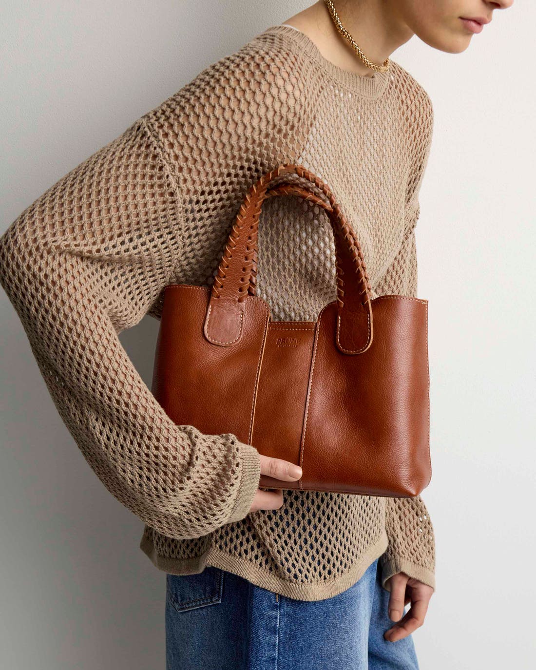 Cartera de mano The Braided en cuero vegetal liso