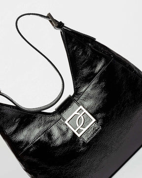 Bolso Signature en cuero charol